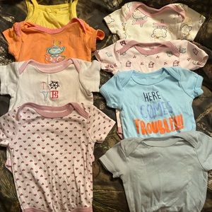 8 onesies 6-9 M